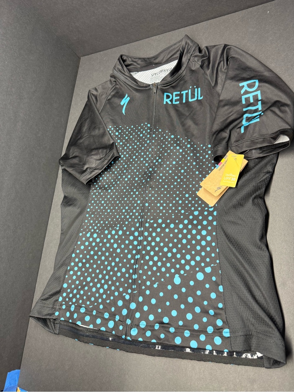 Specialized Black Cycling Jersey with Teal Dot Gradient